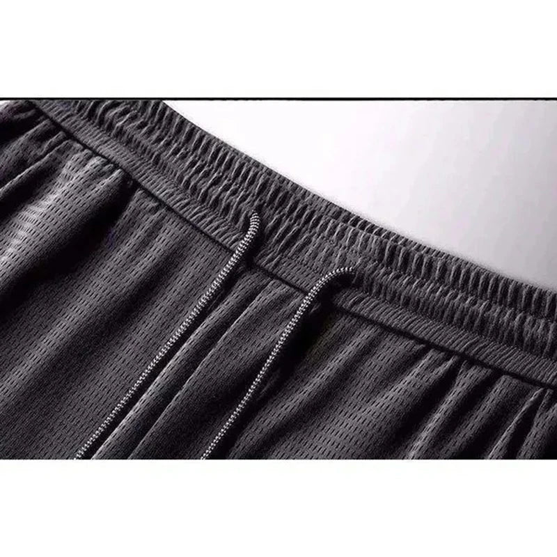 Calça de Treino Masculina de Verão em Seda Gelada - Malha Respirável, Leve, de Secagem Rápida, Solta, com Cós Elástico e Punhos Ajustáveis